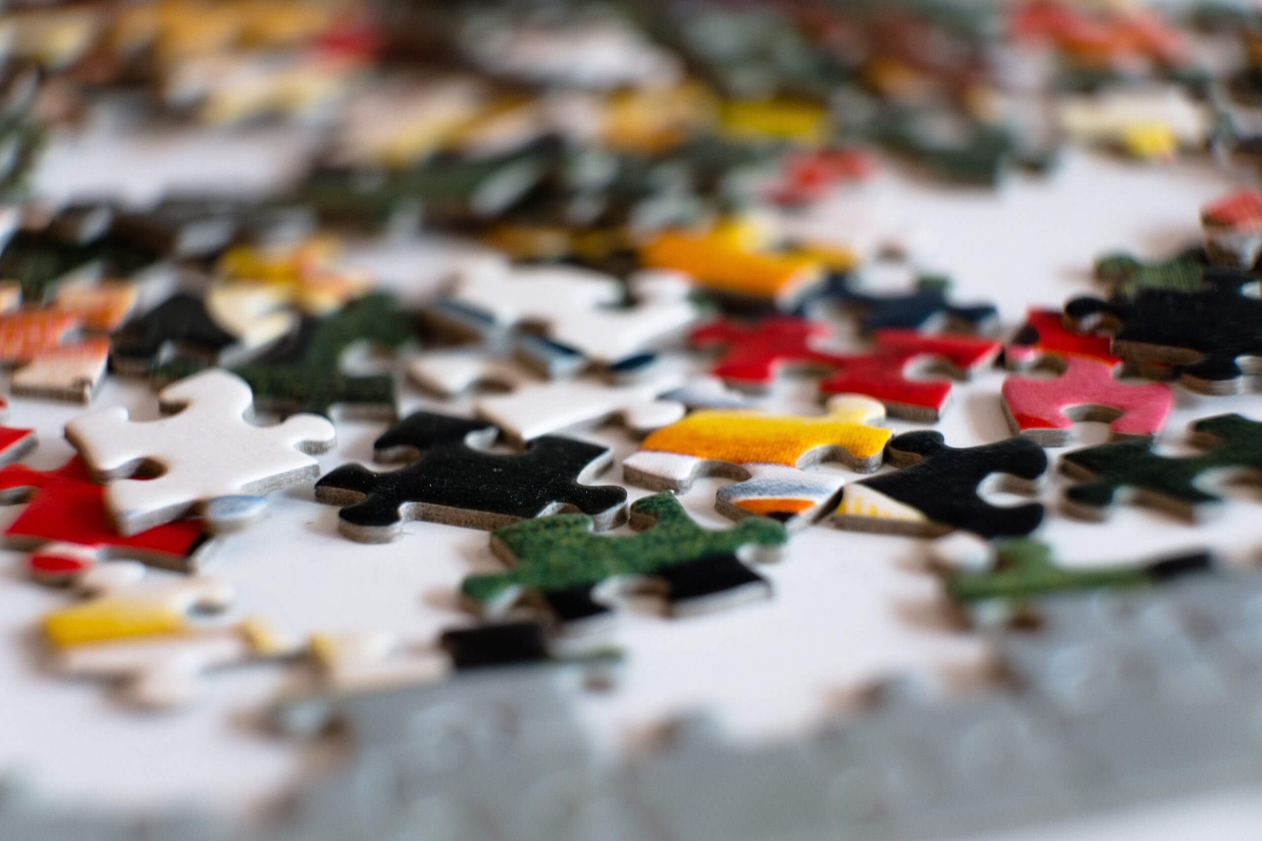 Jigsaw pieces in a pile waiting to be sorted